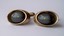 3265 c. 1950s Moderne (ovoid) gold tone cufflinks with recessed gray stones- remind me of the deadly death ray device used by aliens in a cheesy B movie ‘The Mysterians’ back in the late 50s. Signs of normal wear present, but frankly- too funky not to list! No maker’s mark. Size: approx. ¾” x ½”. Price: $25